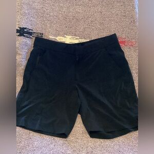 Athleta black shorts -SZ 12- inseam 8”- pockets- small zip pocket